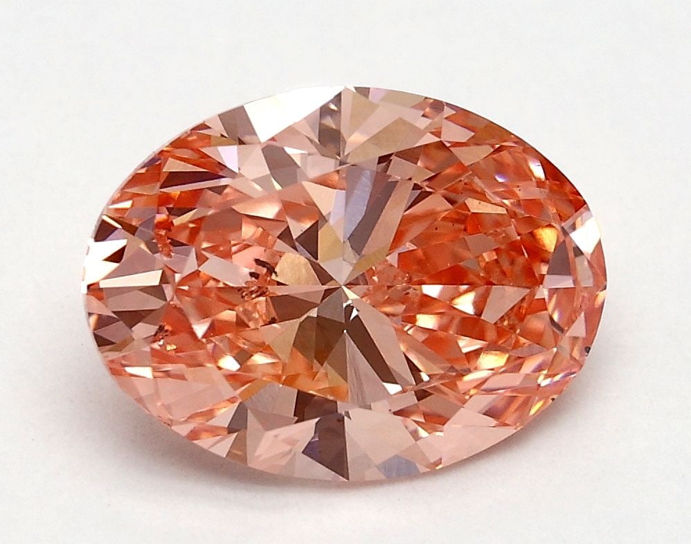 Loose Diamond - OVAL 1.8ct Fancy Vivid Pink VS1: Loose Diamond - OVAL 1.8ct Fancy Vivid Pink VS1 Source: This is a real non-mined Diamond that has been grown in a lab Shape: OVAL Carats: 1.8 Color: Fancy Vivid Pink Certification: IGI Video:
