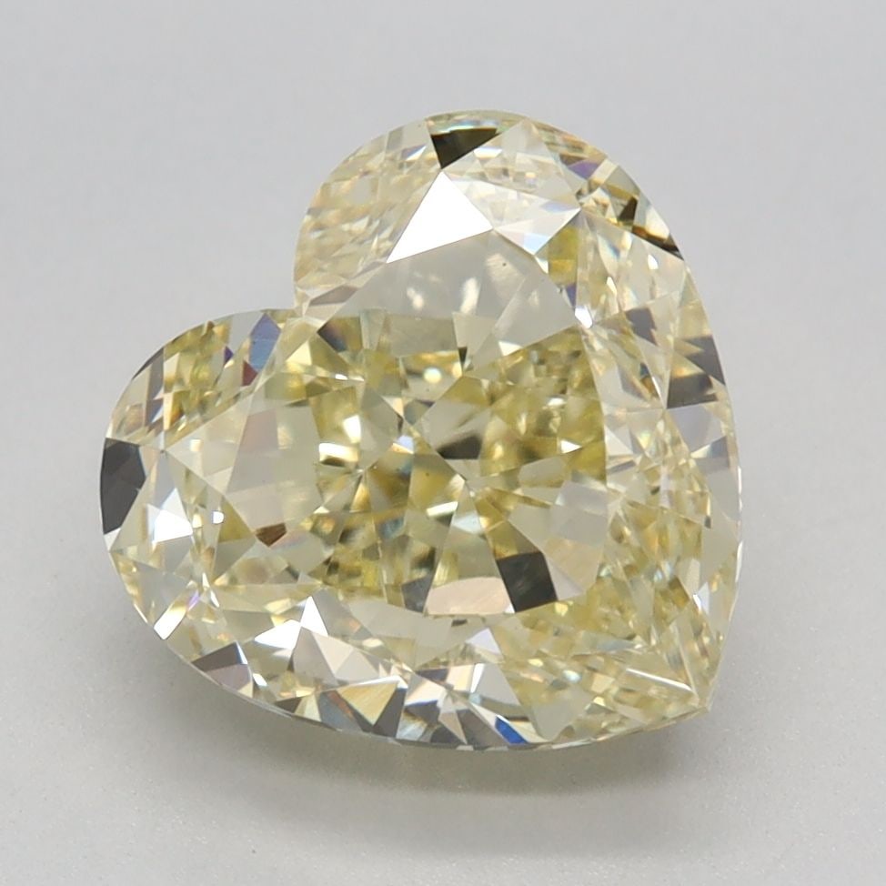 Loose Diamond - HEART 3.05ct Fancy Yellow VS1: Loose Diamond - HEART 3.05ct Fancy Yellow VS1 Source: This is a real non-mined Diamond that has been grown in a lab Shape: HEART Carats: 3.05 Color: Fancy Yellow Certification: IGI Video: