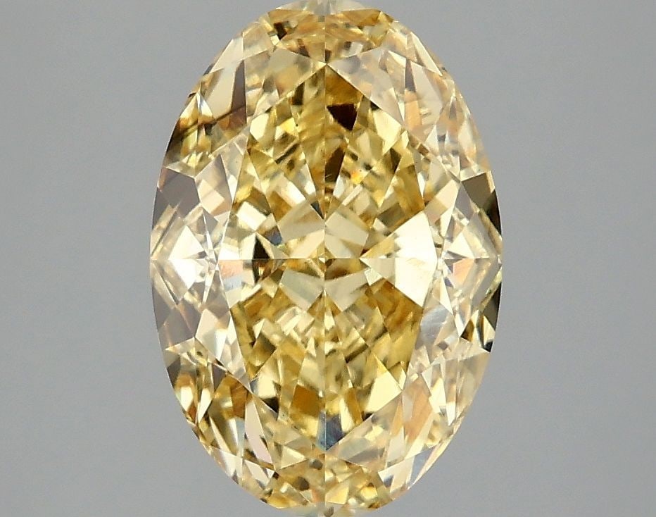 Loose Diamond - OVAL 3.1ct Fancy Vivid Yellow VS1: Loose Diamond - OVAL 3.1ct Fancy Vivid Yellow VS1 Source: This is a real non-mined Diamond that has been grown in a lab Shape: OVAL Carats: 3.1 Color: Fancy Vivid Yellow Certification: IGI Video: