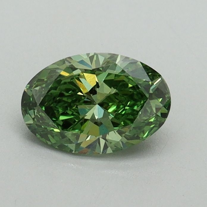 Loose Diamond - OVAL 0.54ct Fancy Vivid Green VS1: Loose Diamond - OVAL 0.54ct Fancy Vivid Green VS1 Source: This is a real non-mined Diamond that has been grown in a lab Shape: OVAL Carats: 0.54 Color: Fancy Vivid Green Certification: IGI Video: