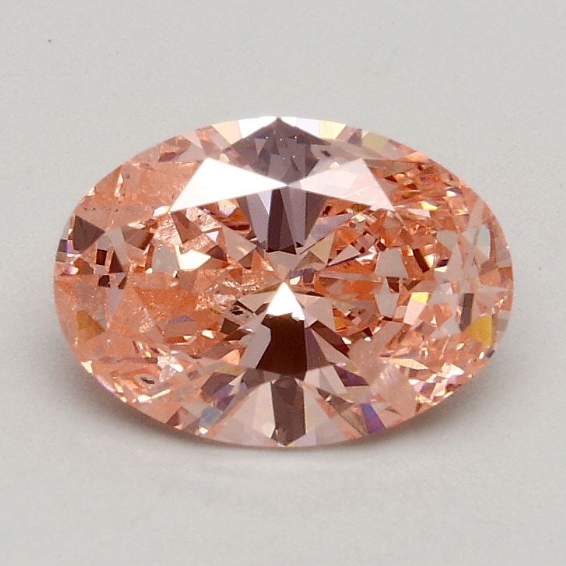 Loose Diamond - OVAL 1.0ct Fancy Intense Pink SI2: Loose Diamond - OVAL 1.0ct Fancy Intense Pink SI2 Source: This is a real non-mined Diamond that has been grown in a lab Shape: OVAL Carats: 1.0 Color: Fancy Intense Pink Certification: IGI Video: