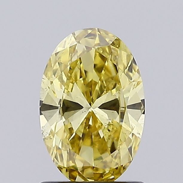 Loose Diamond - OVAL 1.12ct Fancy Vivid Yellow VS2: Loose Diamond - OVAL 1.12ct Fancy Vivid Yellow VS2 Source: This is a real non-mined Diamond that has been grown in a lab Shape: OVAL Carats: 1.12 Color: Fancy Vivid Yellow Certification: NONE Video: