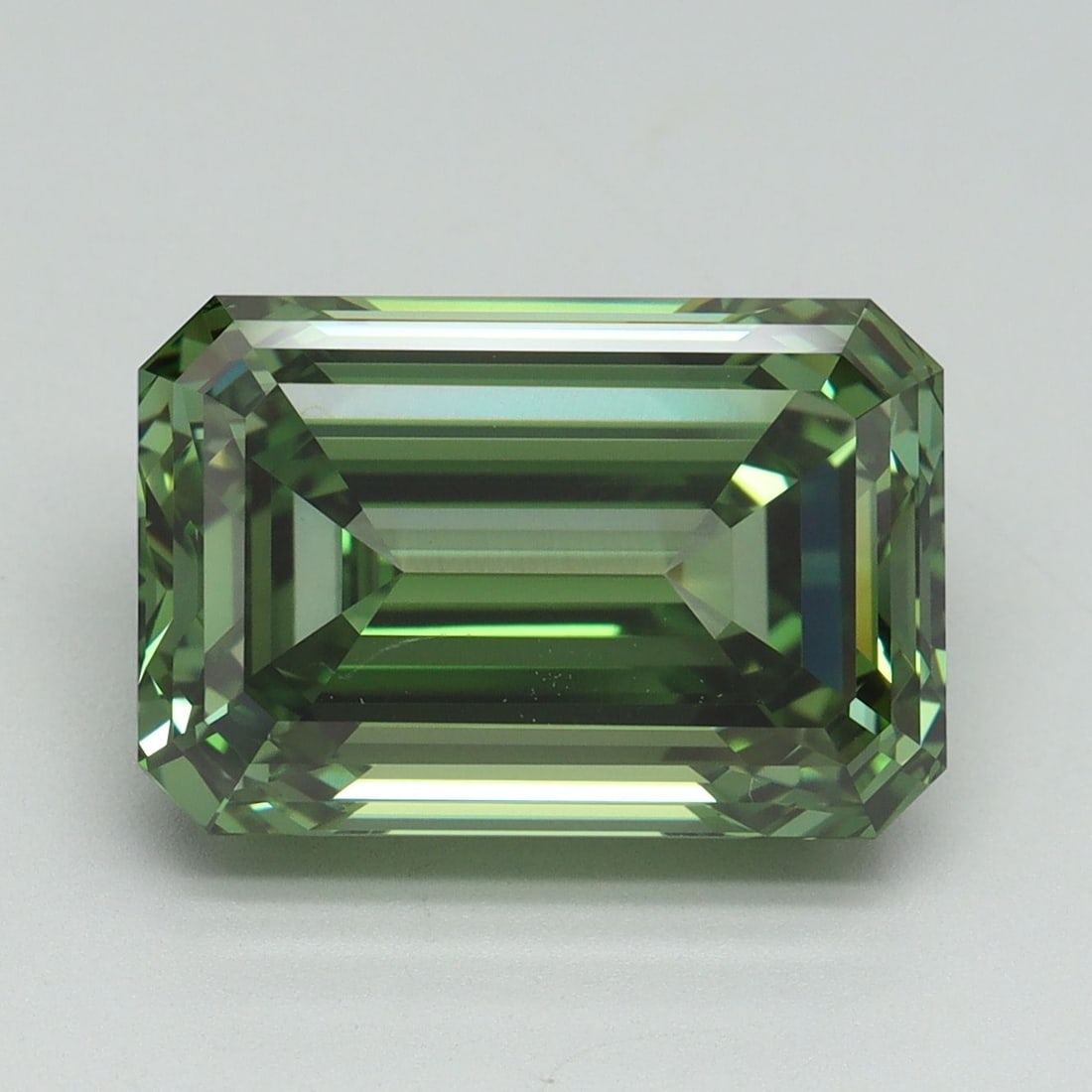 Loose Diamond - EMERALD 7.09ct Fancy Vivid Green VVS1: Loose Diamond - EMERALD 7.09ct Fancy Vivid Green VVS1 Source: This is a real non-mined Diamond that has been grown in a lab Shape: EMERALD Carats: 7.09 Color: Fancy Vivid Green Certification: IGI Vide