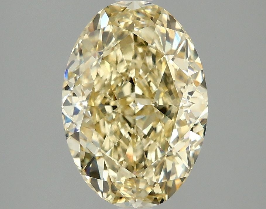 Loose Diamond - OVAL 3.1ct Fancy Intense Yellow VS1: Loose Diamond - OVAL 3.1ct Fancy Intense Yellow VS1 Source: This is a real non-mined Diamond that has been grown in a lab Shape: OVAL Carats: 3.1 Color: Fancy Intense Yellow Certification: IGI Video: