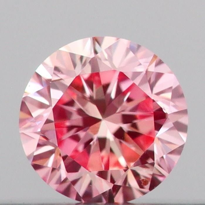 Loose Diamond - ROUND 0.14ct Fancy Intense Pink VS1: Loose Diamond - ROUND 0.14ct Fancy Intense Pink VS1 Source: This is a real non-mined Diamond that has been grown in a lab Shape: ROUND Carats: 0.14 Color: Fancy Intense Pink Certification: IGI Video: