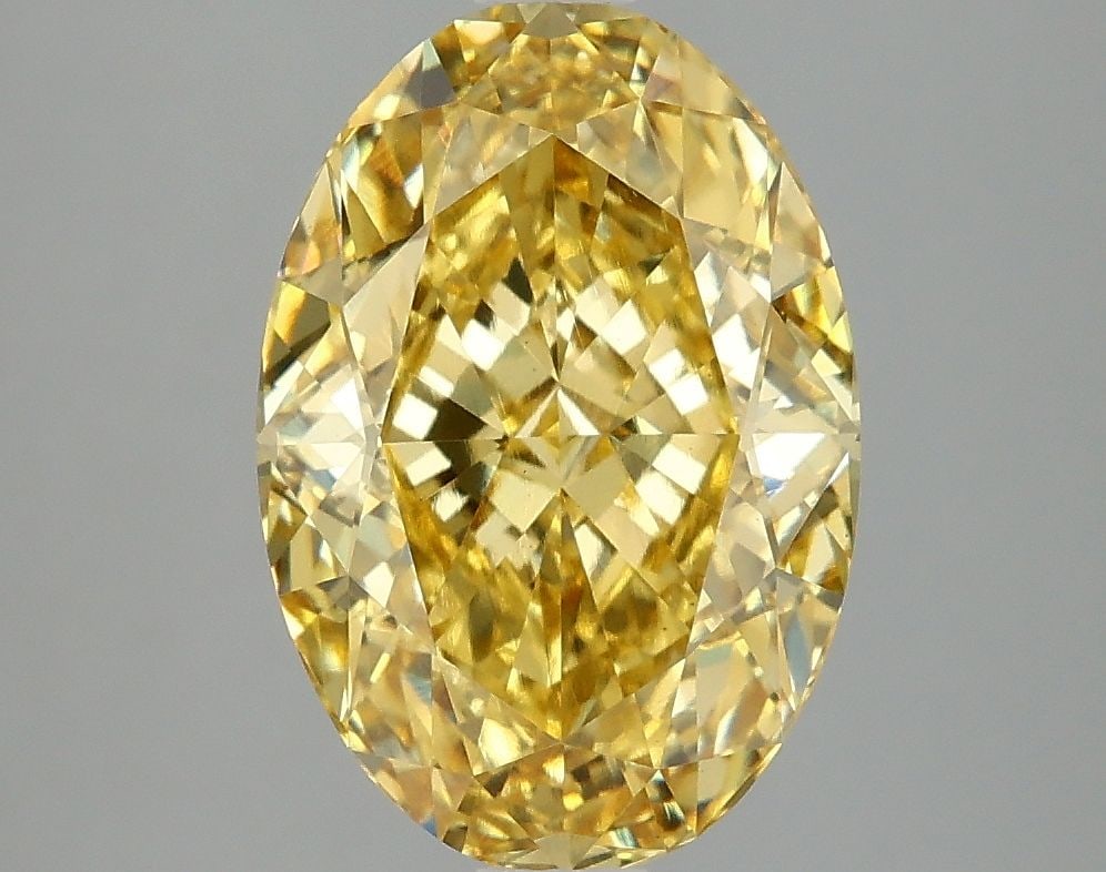 Loose Diamond - OVAL 4.06ct Fancy Vivid Yellow VS1: Loose Diamond - OVAL 4.06ct Fancy Vivid Yellow VS1 Source: This is a real non-mined Diamond that has been grown in a lab Shape: OVAL Carats: 4.06 Color: Fancy Vivid Yellow Certification: IGI Video: