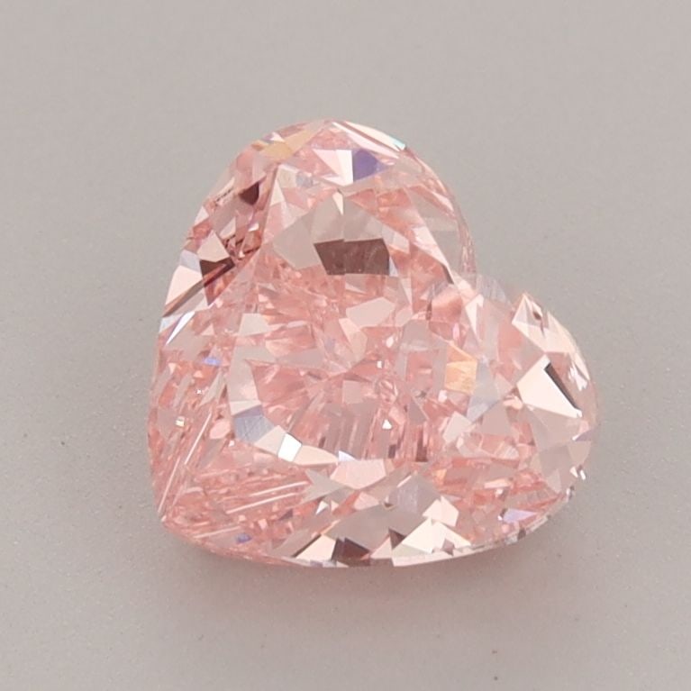 Loose Diamond - HEART 1.68ct Fancy Vivid Pink VVS2: Loose Diamond - HEART 1.68ct Fancy Vivid Pink VVS2 Source: This is a real non-mined Diamond that has been grown in a lab Shape: HEART Carats: 1.68 Color: Fancy Vivid Pink Certification: IGI Video:
