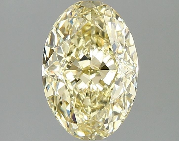 Loose Diamond - OVAL 2.1ct Fancy Intense Yellow VS2: Loose Diamond - OVAL 2.1ct Fancy Intense Yellow VS2 Source: This is a real non-mined Diamond that has been grown in a lab Shape: OVAL Carats: 2.1 Color: Fancy Intense Yellow Certification: IGI Video:
