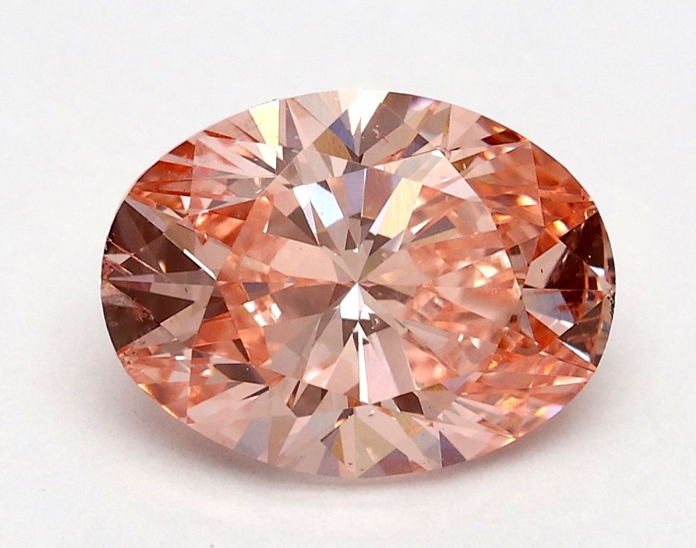 Loose Diamond - OVAL 1.71ct Fancy Vivid Pink SI1: Loose Diamond - OVAL 1.71ct Fancy Vivid Pink SI1 Source: This is a real non-mined Diamond that has been grown in a lab Shape: OVAL Carats: 1.71 Color: Fancy Vivid Pink Certification: IGI Video: