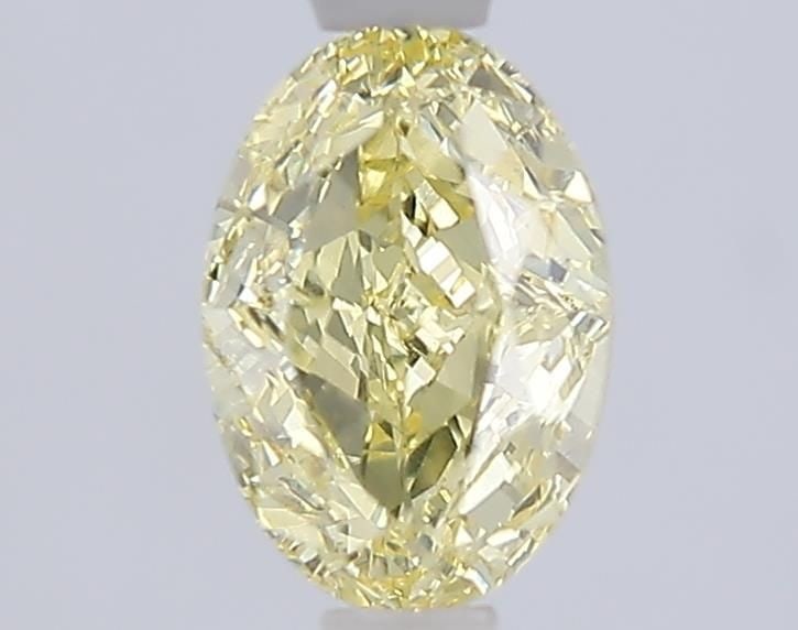 Loose Diamond - OVAL 1.0ct Fancy Yellow VVS2: Loose Diamond - OVAL 1.0ct Fancy Yellow VVS2 Source: This is a real non-mined Diamond that has been grown in a lab Shape: OVAL Carats: 1.0 Color: Fancy Yellow Certification: IGI Video: