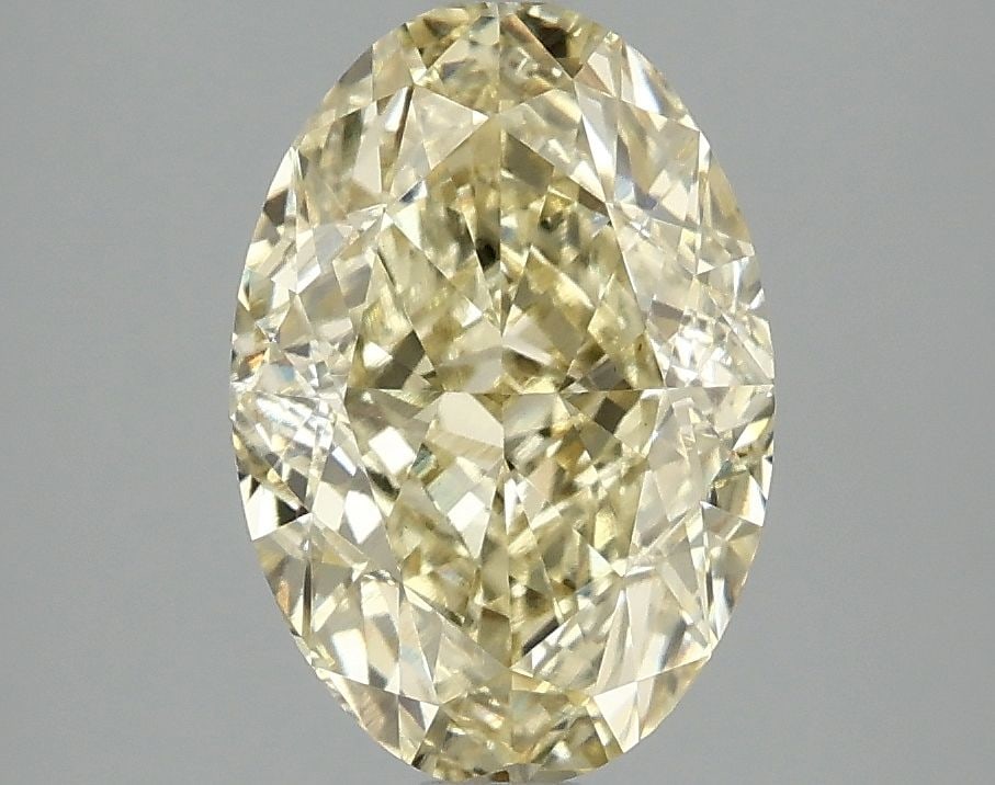 Loose Diamond - OVAL 3.1ct Fancy Intense Yellow VS1: Loose Diamond - OVAL 3.1ct Fancy Intense Yellow VS1 Source: This is a real non-mined Diamond that has been grown in a lab Shape: OVAL Carats: 3.1 Color: Fancy Intense Yellow Certification: IGI Video: