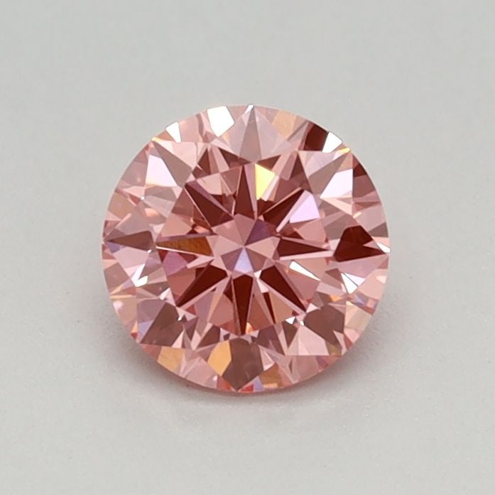 Loose Diamond - ROUND 0.43ct Fancy Vivid Pink VVS2: Loose Diamond - ROUND 0.43ct Fancy Vivid Pink VVS2 Source: This is a real non-mined Diamond that has been grown in a lab Shape: ROUND Carats: 0.43 Color: Fancy Vivid Pink Certification: IGI Video: