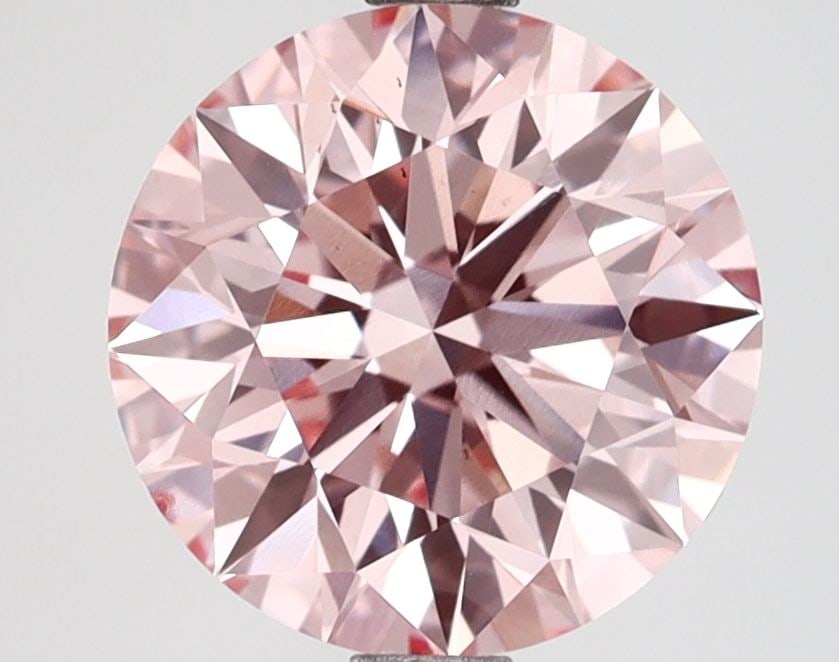 Loose Diamond - ROUND 2.72ct Fancy Vivid Pink VS1: Loose Diamond - ROUND 2.72ct Fancy Vivid Pink VS1 Source: This is a real non-mined Diamond that has been grown in a lab Shape: ROUND Carats: 2.72 Color: Fancy Vivid Pink Certification: IGI Video: