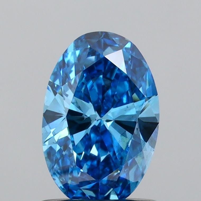Loose Diamond - OVAL 0.78ct Fancy Vivid Blue SI1: Loose Diamond - OVAL 0.78ct Fancy Vivid Blue SI1 Source: This is a real non-mined Diamond that has been grown in a lab Shape: OVAL Carats: 0.78 Color: Fancy Vivid Blue Certification: IGI Video: