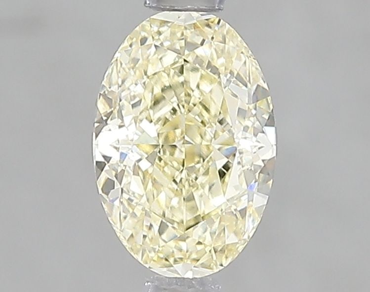 Loose Diamond - OVAL 1.04ct Fancy Yellow VVS2: Loose Diamond - OVAL 1.04ct Fancy Yellow VVS2 Source: This is a real non-mined Diamond that has been grown in a lab Shape: OVAL Carats: 1.04 Color: Fancy Yellow Certification: IGI Video: