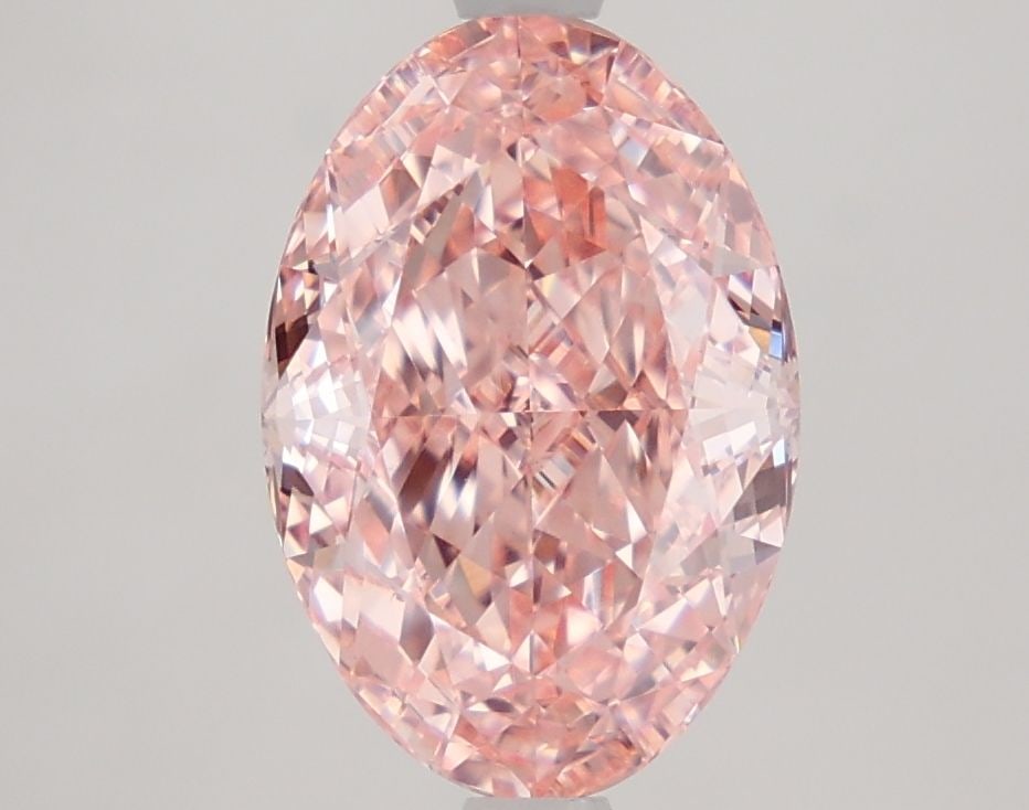 Loose Diamond - OVAL 3.04ct Fancy Vivid Pink VVS2: Loose Diamond - OVAL 3.04ct Fancy Vivid Pink VVS2 Source: This is a real non-mined Diamond that has been grown in a lab Shape: OVAL Carats: 3.04 Color: Fancy Vivid Pink Certification: IGI Video: