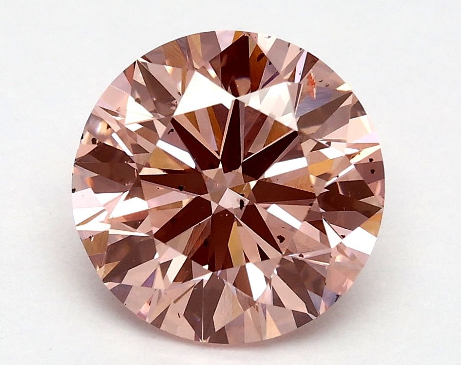 Ideal Loose Diamond - ROUND 1.8ct Fancy Vivid Pink SI2: Ideal Loose Diamond - ROUND 1.8ct Fancy Vivid Pink SI2 Source: This is a real non-mined Diamond that has been grown in a lab Shape: ROUND Carats: 1.8 Color: Fancy Vivid Pink Certification: IGI Video: