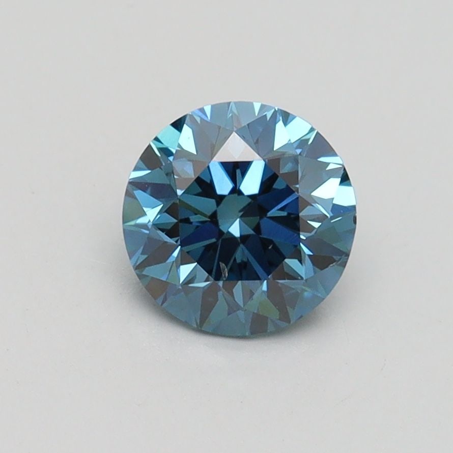 Loose Diamond - ROUND 0.96ct Fancy Vivid Blue SI1: Loose Diamond - ROUND 0.96ct Fancy Vivid Blue SI1 Source: This is a real non-mined Diamond that has been grown in a lab Shape: ROUND Carats: 0.96 Color: Fancy Vivid Blue Certification: IGI Video: