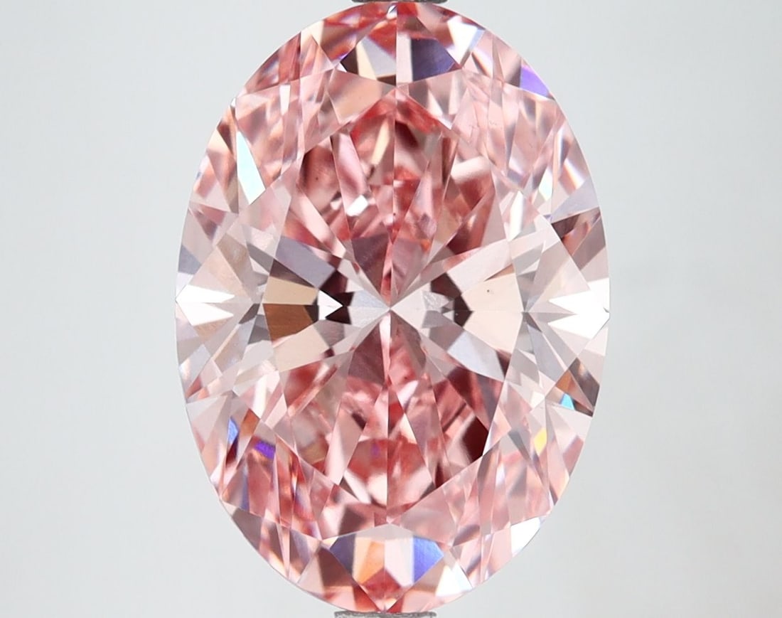 Loose Diamond - OVAL 4.57ct Fancy Vivid Pink VS1: Loose Diamond - OVAL 4.57ct Fancy Vivid Pink VS1 Source: This is a real non-mined Diamond that has been grown in a lab Shape: OVAL Carats: 4.57 Color: Fancy Vivid Pink Certification: IGI Video: