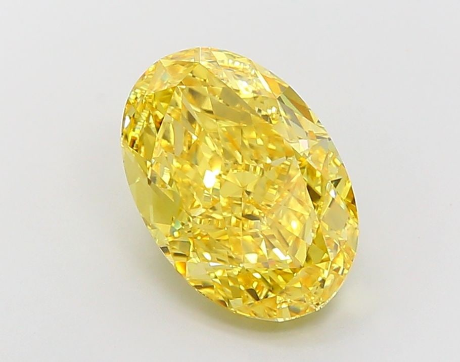 Loose Diamond - OVAL 7.15ct Fancy Vivid Yellow VVS2: Loose Diamond - OVAL 7.15ct Fancy Vivid Yellow VVS2 Source: This is a real non-mined Diamond that has been grown in a lab Shape: OVAL Carats: 7.15 Color: Fancy Vivid Yellow Certification: IGI Video: