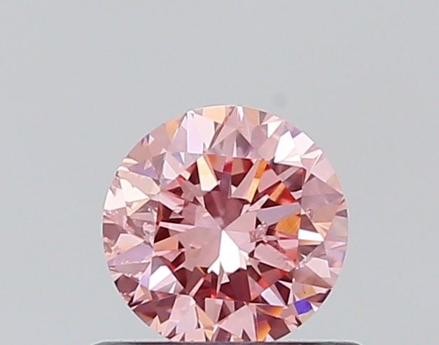 Loose Diamond - ROUND 0.51ct Fancy Vivid Pink SI2: Loose Diamond - ROUND 0.51ct Fancy Vivid Pink SI2 Source: This is a real non-mined Diamond that has been grown in a lab Shape: ROUND Carats: 0.51 Color: Fancy Vivid Pink Certification: NONE The Diamon