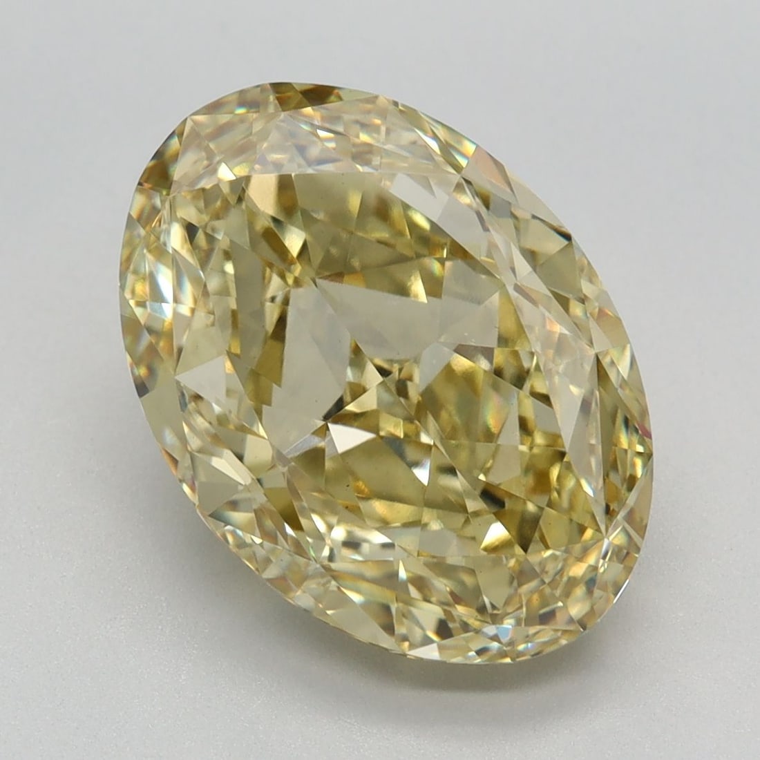 Loose Diamond - OVAL 5.51ct Fancy Vivid Yellow VS1: Loose Diamond - OVAL 5.51ct Fancy Vivid Yellow VS1 Source: This is a real non-mined Diamond that has been grown in a lab Shape: OVAL Carats: 5.51 Color: Fancy Vivid Yellow Certification: IGI Video: