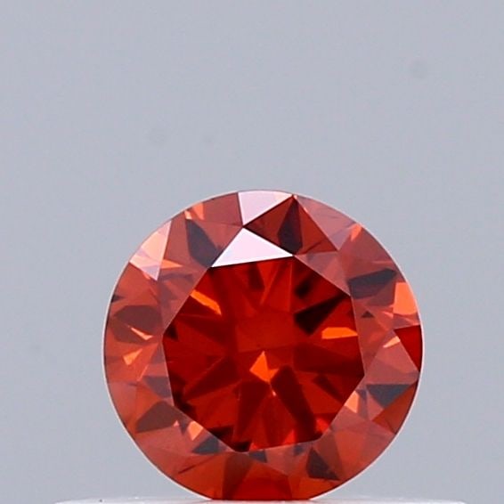 Loose Diamond - ROUND 0.35ct Fancy Vivid Orange VS2: Loose Diamond - ROUND 0.35ct Fancy Vivid Orange VS2 Source: This is a real non-mined Diamond that has been grown in a lab Shape: ROUND Carats: 0.35 Color: Fancy Vivid Orange Certification: IGI Video: