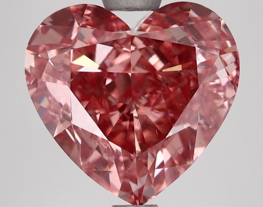 Loose Diamond - HEART 4.0ct Fancy Vivid Pink VS2: Loose Diamond - HEART 4.0ct Fancy Vivid Pink VS2 Source: This is a real non-mined Diamond that has been grown in a lab Shape: HEART Carats: 4.0 Color: Fancy Vivid Pink Certification: IGI Video: