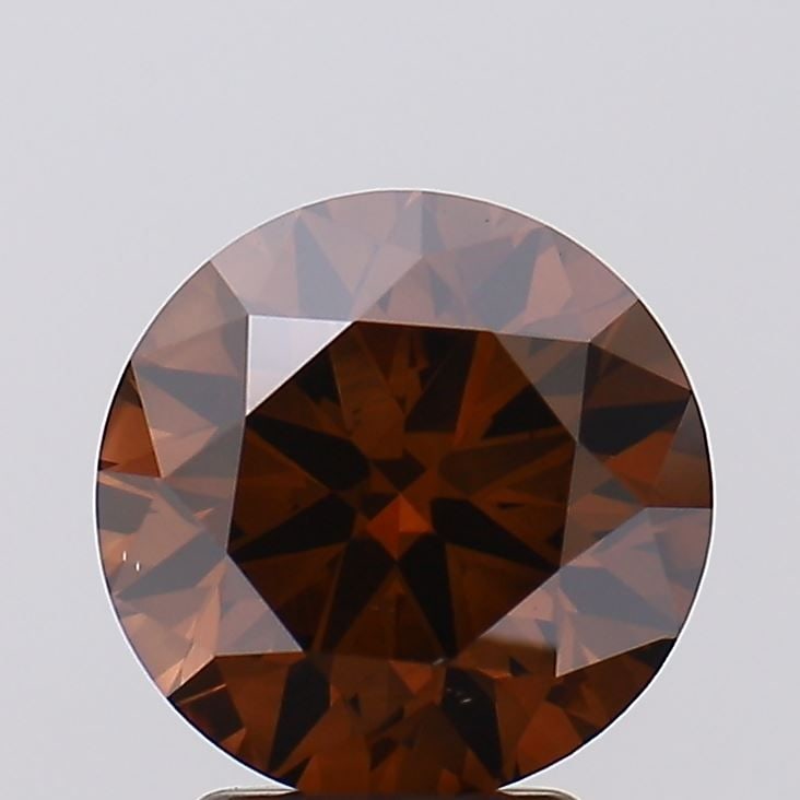 Loose Diamond - ROUND 3.13ct Fancy Deep Brown VS2: Loose Diamond - ROUND 3.13ct Fancy Deep Brown VS2 Source: This is a real non-mined Diamond that has been grown in a lab Shape: ROUND Carats: 3.13 Color: Fancy Deep Brown Certification: IGI The Diamond