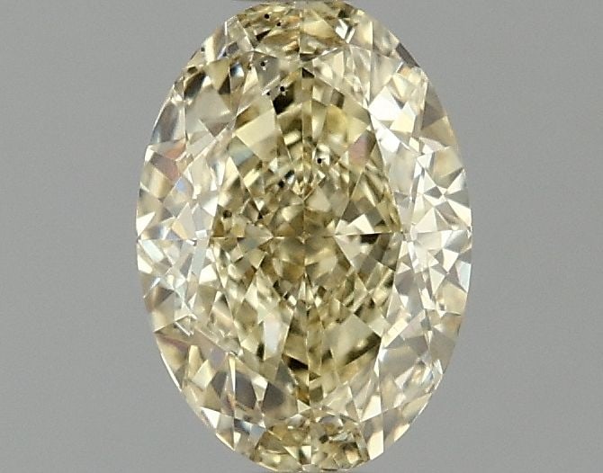 Loose Diamond - OVAL 1.1ct Fancy Vivid Yellow VS2: Loose Diamond - OVAL 1.1ct Fancy Vivid Yellow VS2 Source: This is a real non-mined Diamond that has been grown in a lab Shape: OVAL Carats: 1.1 Color: Fancy Vivid Yellow Certification: IGI Video: