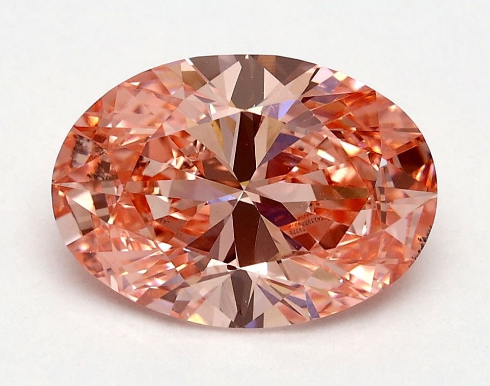 Loose Diamond - OVAL 1.76ct Fancy Vivid Pink VS2: Loose Diamond - OVAL 1.76ct Fancy Vivid Pink VS2 Source: This is a real non-mined Diamond that has been grown in a lab Shape: OVAL Carats: 1.76 Color: Fancy Vivid Pink Certification: IGI Video: