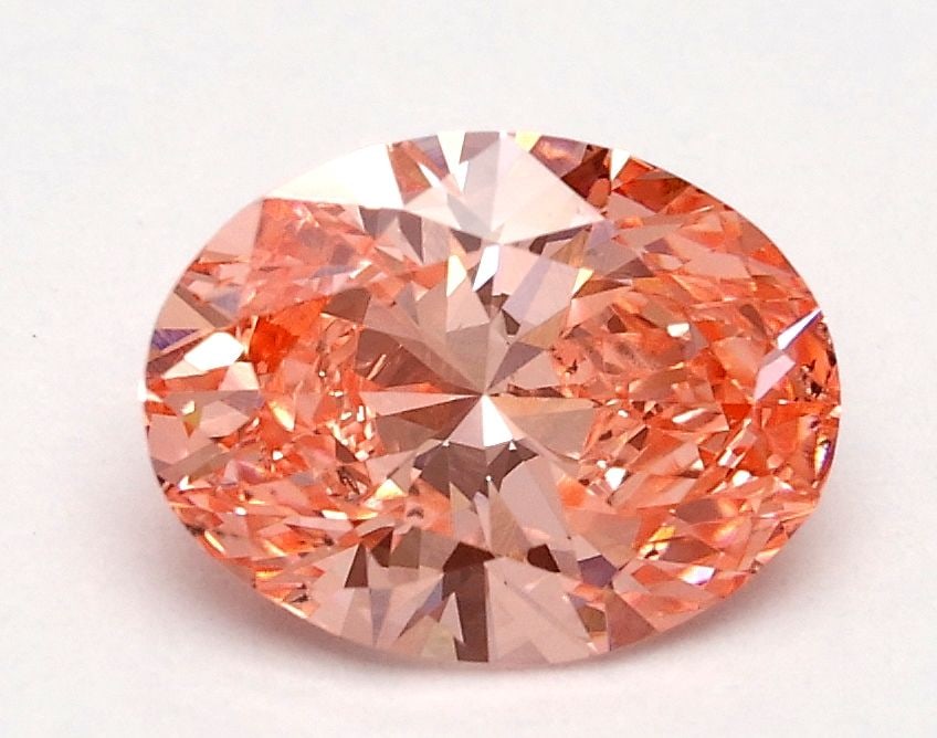 Loose Diamond - OVAL 1.01ct Fancy Vivid Pink VS2: Loose Diamond - OVAL 1.01ct Fancy Vivid Pink VS2 Source: This is a real non-mined Diamond that has been grown in a lab Shape: OVAL Carats: 1.01 Color: Fancy Vivid Pink Certification: IGI Video:
