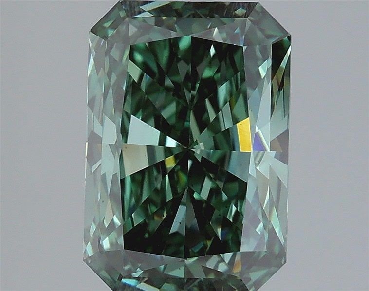 Loose Diamond - RADIANT 3.03ct Fancy Vivid Green VS2: Loose Diamond - RADIANT 3.03ct Fancy Vivid Green VS2 Source: This is a real non-mined Diamond that has been grown in a lab Shape: RADIANT Carats: 3.03 Color: Fancy Vivid Green Certification: IGI Video
