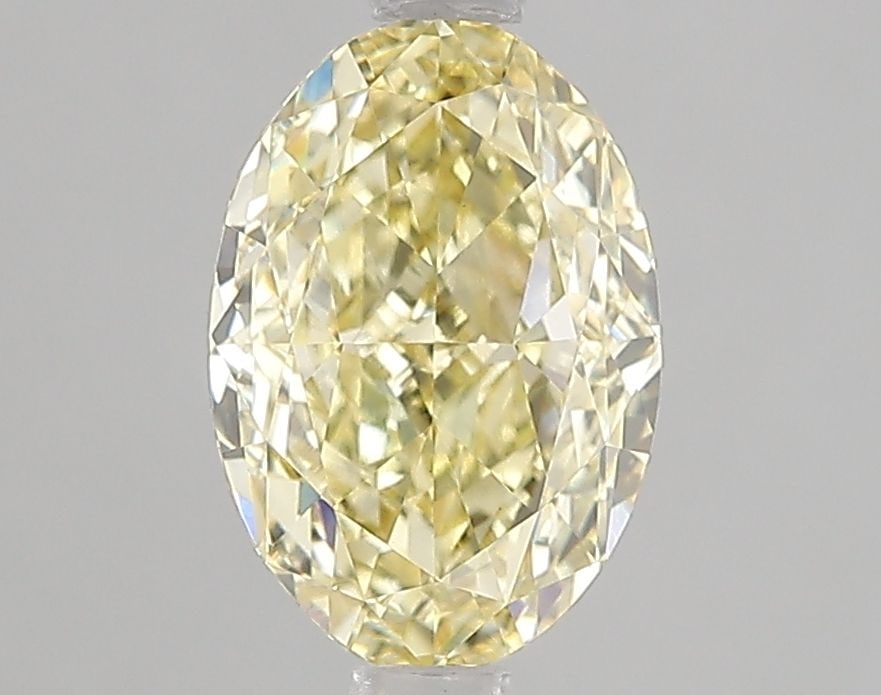 Loose Diamond - OVAL 2.0ct Fancy Yellow VVS2: Loose Diamond - OVAL 2.0ct Fancy Yellow VVS2 Source: This is a real non-mined Diamond that has been grown in a lab Shape: OVAL Carats: 2.0 Color: Fancy Yellow Certification: IGI Video: