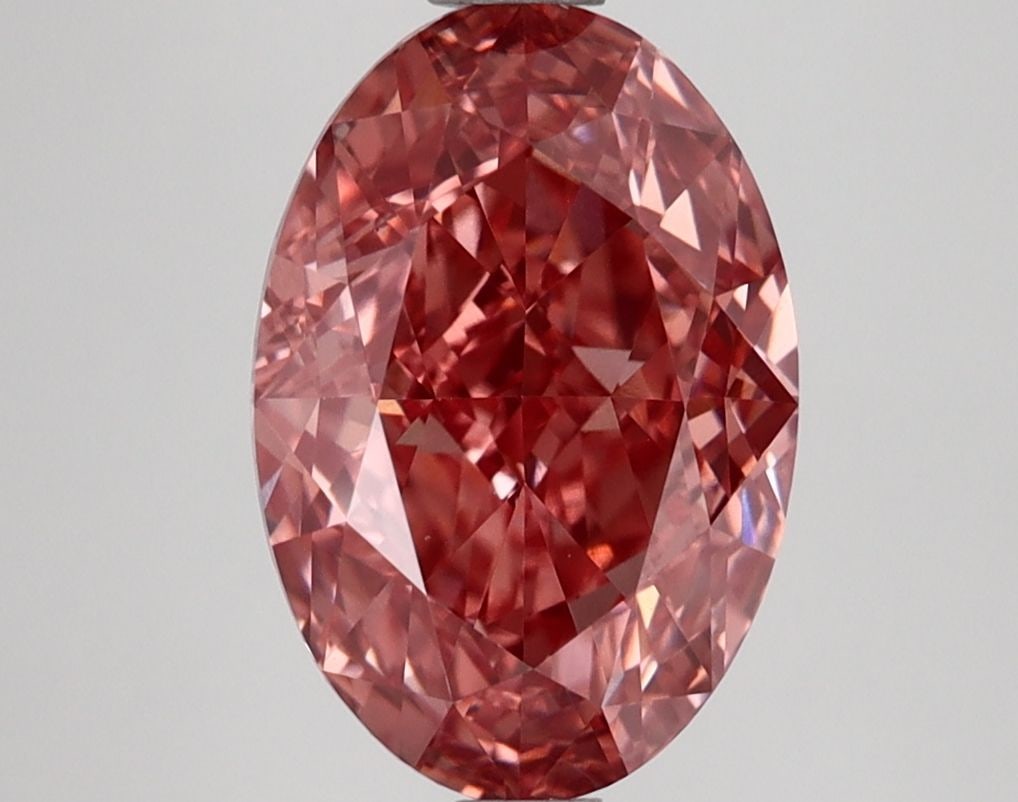 Loose Diamond - OVAL 3.28ct Fancy Vivid Pink VVS2: Loose Diamond - OVAL 3.28ct Fancy Vivid Pink VVS2 Source: This is a real non-mined Diamond that has been grown in a lab Shape: OVAL Carats: 3.28 Color: Fancy Vivid Pink Certification: IGI Video:
