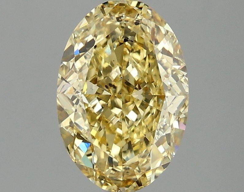 Loose Diamond - OVAL 2.05ct Fancy Intense Yellow SI1: Loose Diamond - OVAL 2.05ct Fancy Intense Yellow SI1 Source: This is a real non-mined Diamond that has been grown in a lab Shape: OVAL Carats: 2.05 Color: Fancy Intense Yellow Certification: IGI Video