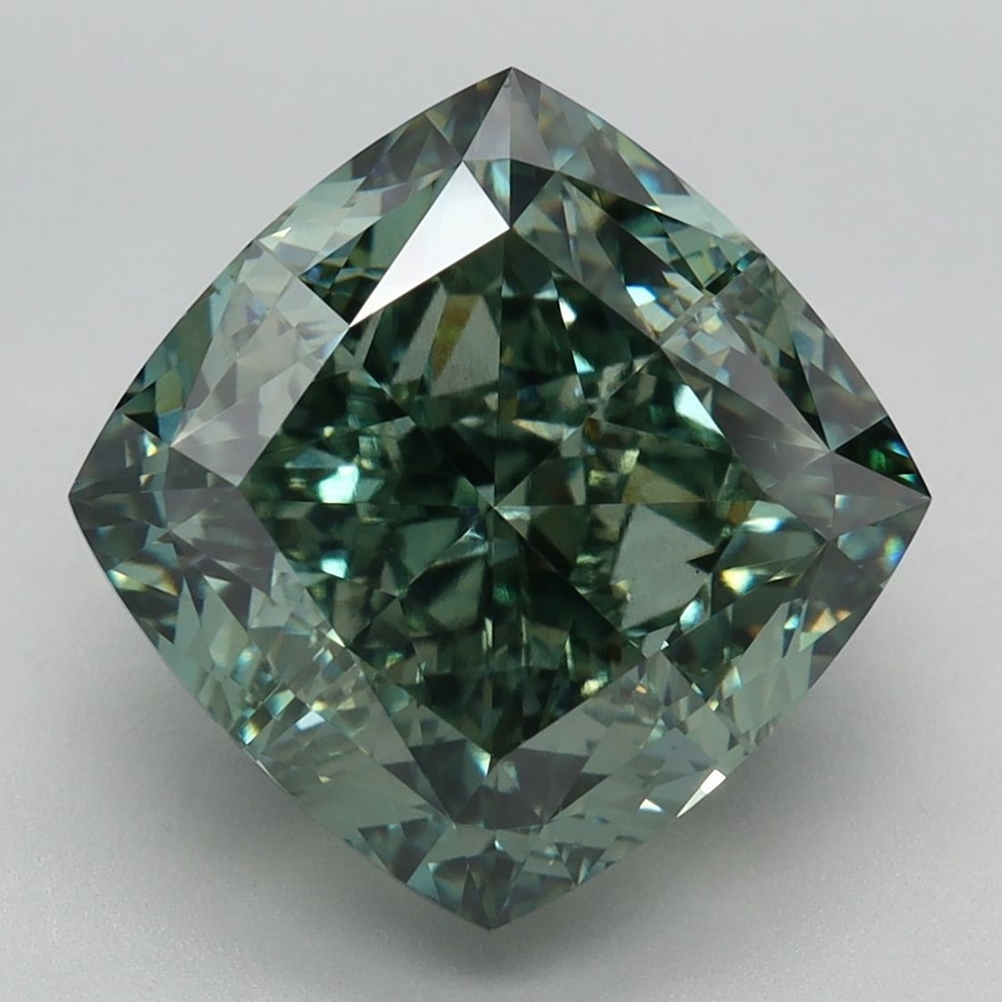 Loose Diamond - CUSHION MODIFIED 6.74ct Fancy Vivid Green VS1: Loose Diamond - CUSHION MODIFIED 6.74ct Fancy Vivid Green VS1 Source: This is a real non-mined Diamond that has been grown in a lab Shape: CUSHION MODIFIED Carats: 6.74 Color: Fancy Vivid Green Certif