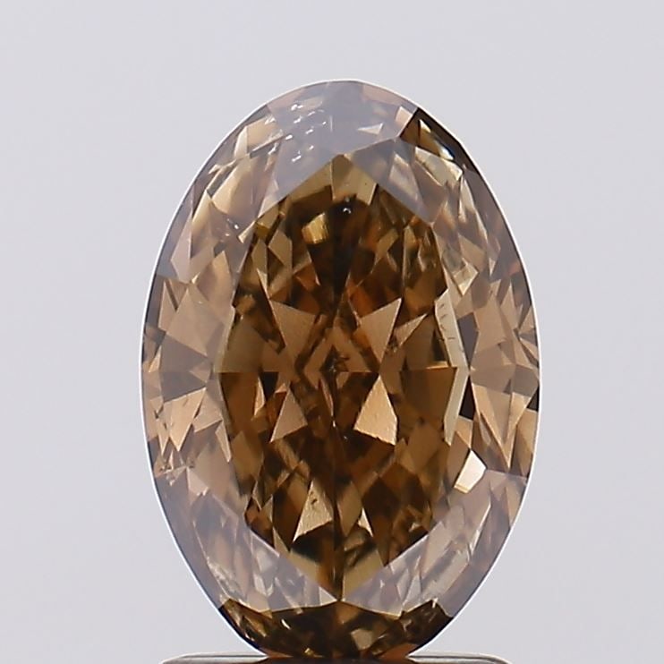 Loose Diamond - OVAL 1.61ct Fancy Brown VS2: Loose Diamond - OVAL 1.61ct Fancy Brown VS2 Source: This is a real non-mined Diamond that has been grown in a lab Shape: OVAL Carats: 1.61 Color: Fancy Brown Certification: IGI Video: