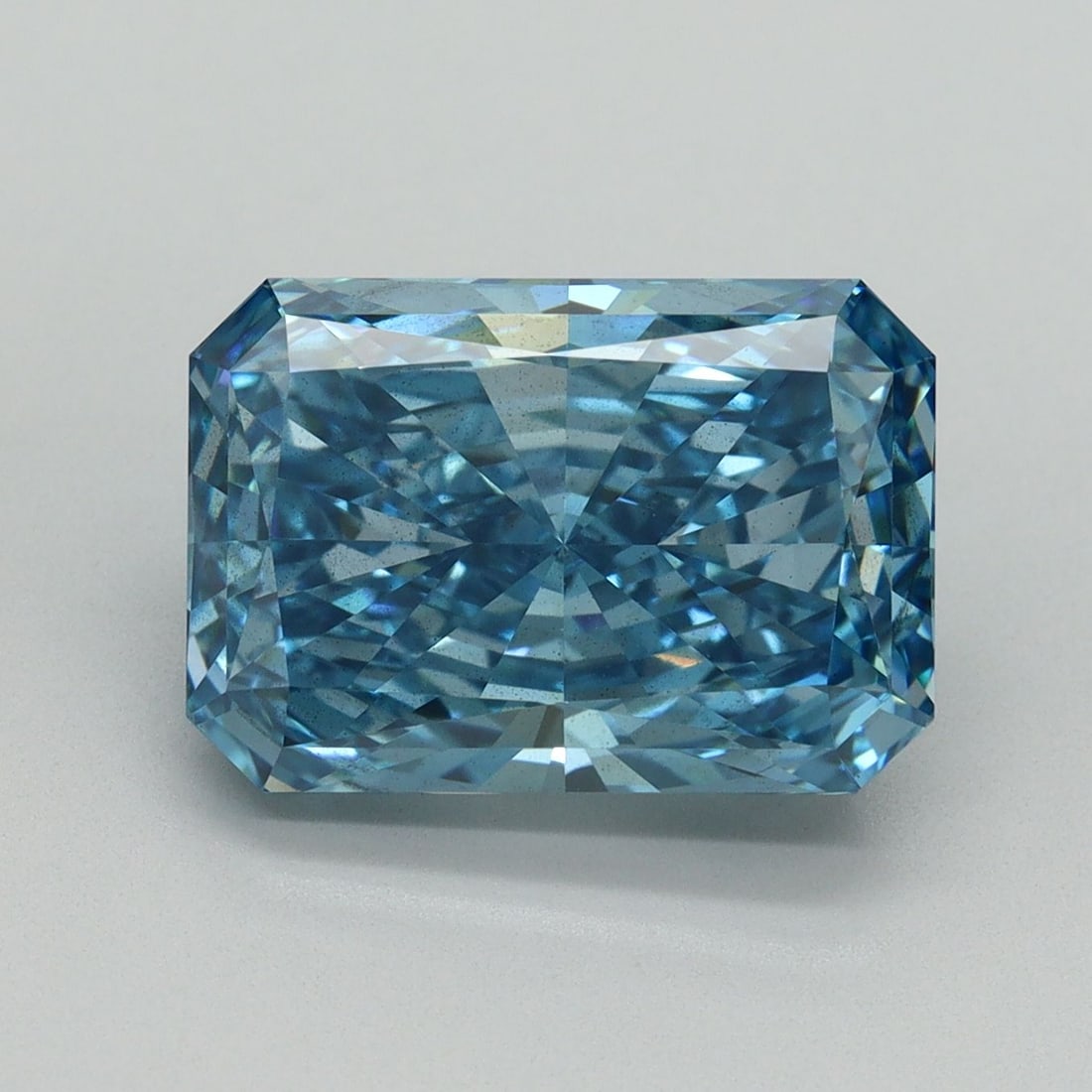 Loose Diamond - RADIANT 5.18ct Fancy Vivid Blue SI1: Loose Diamond - RADIANT 5.18ct Fancy Vivid Blue SI1 Source: This is a real non-mined Diamond that has been grown in a lab Shape: RADIANT Carats: 5.18 Color: Fancy Vivid Blue Certification: IGI Video: