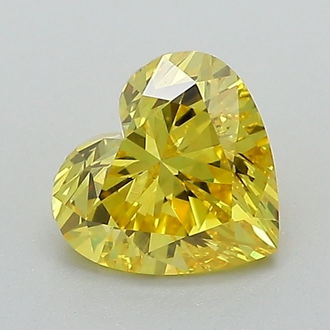 Loose Diamond - HEART 1.02ct Fancy Vivid Yellow VVS2: Loose Diamond - HEART 1.02ct Fancy Vivid Yellow VVS2 Source: This is a real non-mined Diamond that has been grown in a lab Shape: HEART Carats: 1.02 Color: Fancy Vivid Yellow Certification: IGI Video: