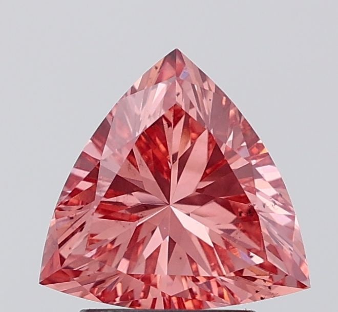 Loose Diamond - TRIANGULAR 1.6ct Fancy Vivid Pink VS2: Loose Diamond - TRIANGULAR 1.6ct Fancy Vivid Pink VS2 Source: This is a real non-mined Diamond that has been grown in a lab Shape: TRIANGULAR Carats: 1.6 Color: Fancy Vivid Pink Certification: IGI Vid