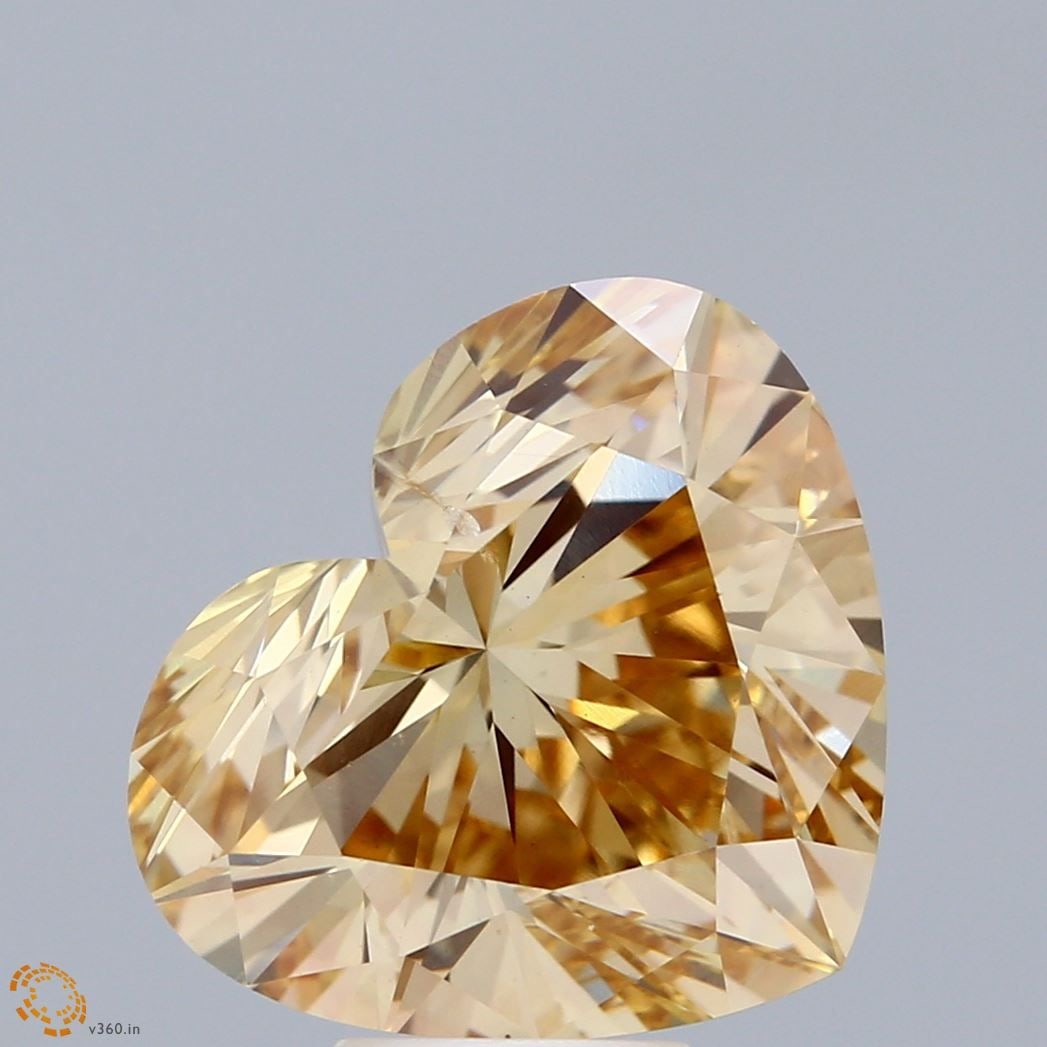 Loose Diamond - HEART 6.0ct Fancy Intense Brownish Yellow SI1: Loose Diamond - HEART 6.0ct Fancy Intense Brownish Yellow SI1 Source: This is a real non-mined Diamond that has been grown in a lab Shape: HEART Carats: 6.0 Color: Fancy Intense Brownish Yellow Certif