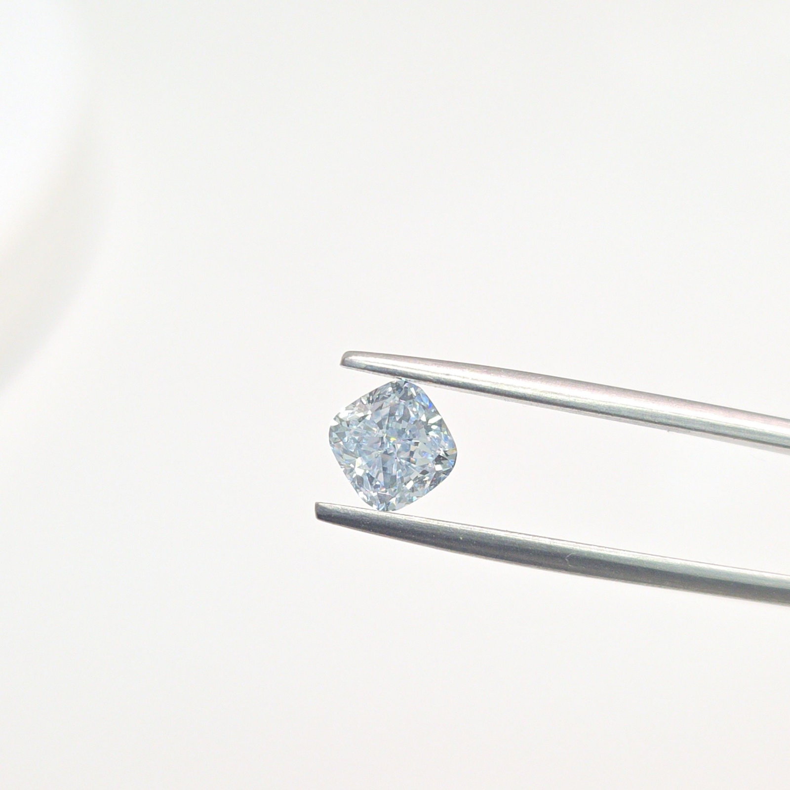 Loose Diamond - CUSHION MODIFIED 1.13ct Fancy Light Blue VVS2: Loose Diamond - CUSHION MODIFIED 1.13ct Fancy Light Blue VVS2 Source: This is a real non-mined Diamond that has been grown in a lab Shape: CUSHION MODIFIED Carats: 1.13 Color: Fancy Light Blue Certifi