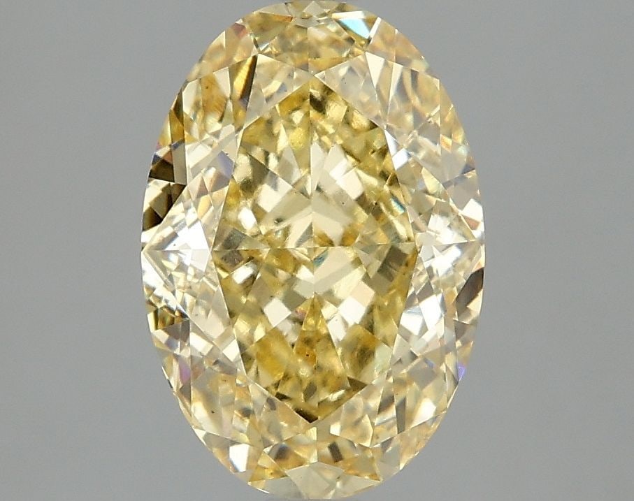 Loose Diamond - OVAL 3.05ct Fancy Vivid Yellow VS2: Loose Diamond - OVAL 3.05ct Fancy Vivid Yellow VS2 Source: This is a real non-mined Diamond that has been grown in a lab Shape: OVAL Carats: 3.05 Color: Fancy Vivid Yellow Certification: IGI Video: