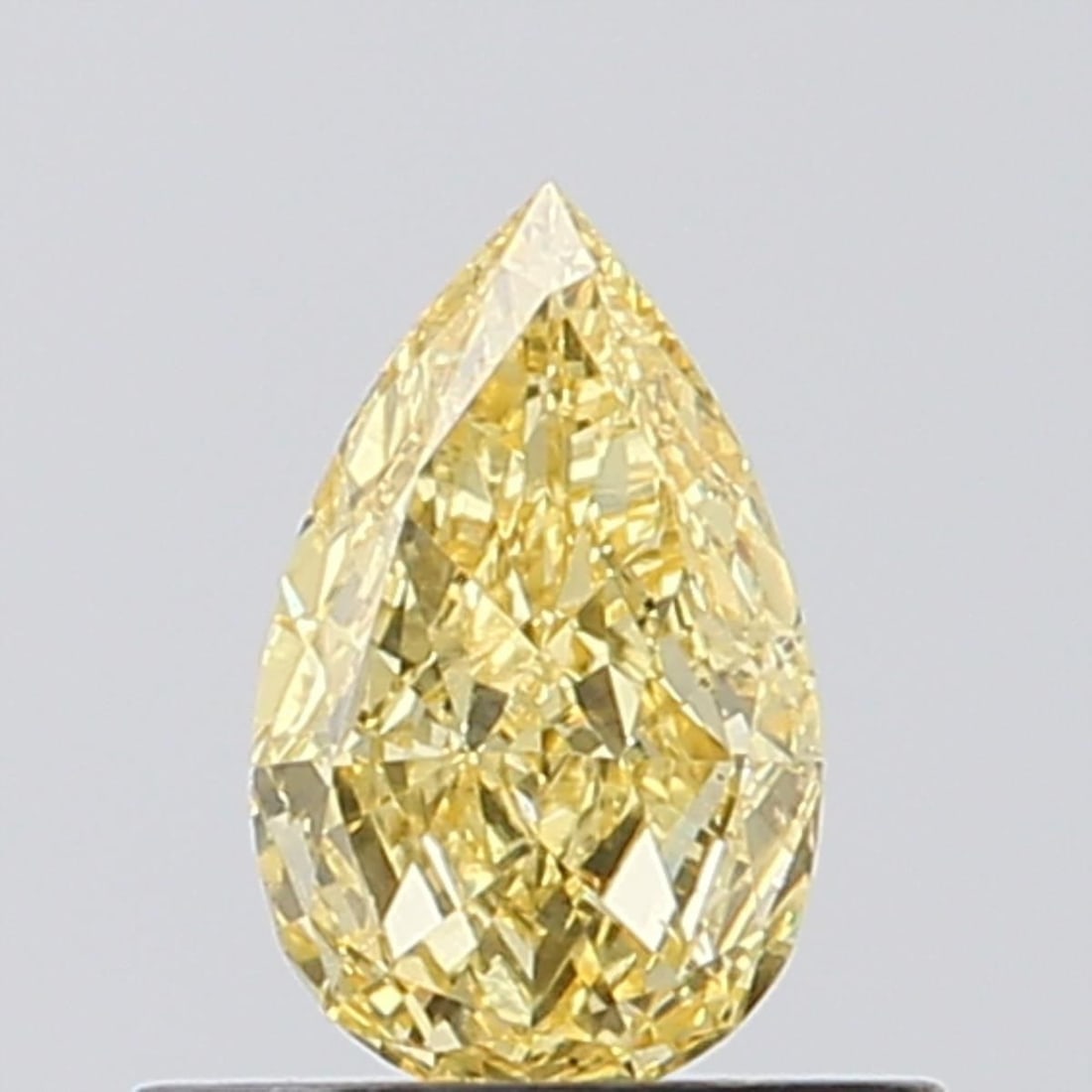 Loose Diamond - PEAR 0.44ct Fancy Vivid Yellow VS2: Loose Diamond - PEAR 0.44ct Fancy Vivid Yellow VS2 Source: This is a real non-mined Diamond that has been grown in a lab Shape: PEAR Carats: 0.44 Color: Fancy Vivid Yellow Certification: NONE Video: