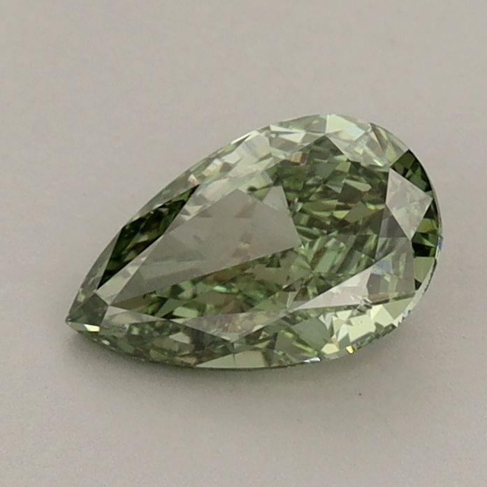 Loose Diamond - PEAR 0.8ct Fancy Vivid Green VS2: Loose Diamond - PEAR 0.8ct Fancy Vivid Green VS2 Source: This is a real non-mined Diamond that has been grown in a lab Shape: PEAR Carats: 0.8 Color: Fancy Vivid Green Certification: IGI Video: