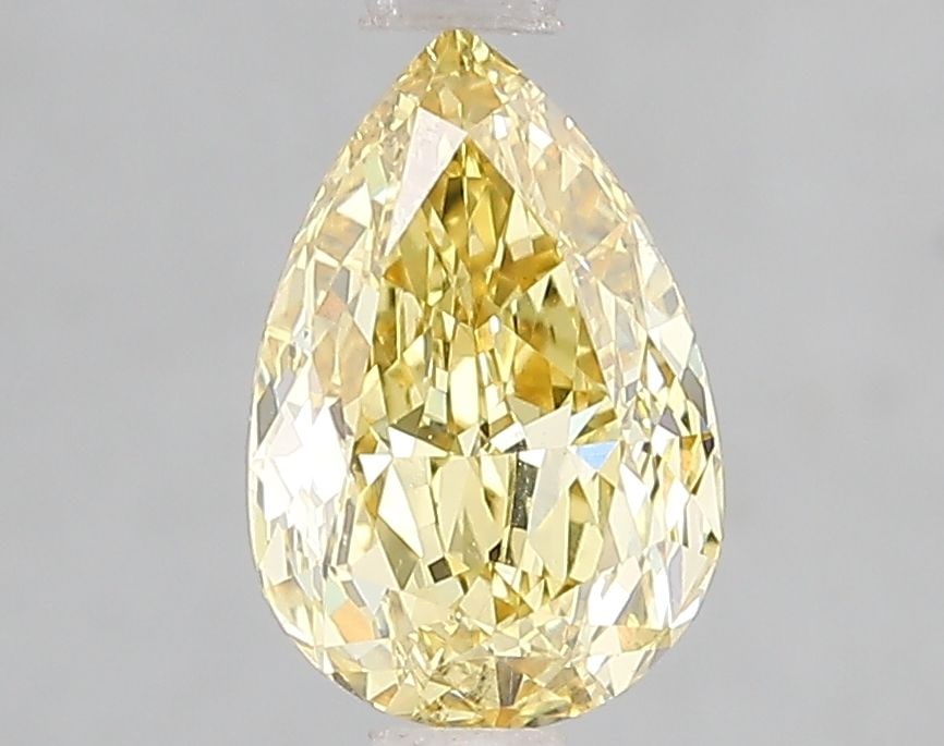 Loose Diamond - PEAR 1.6ct Fancy Vivid Yellow VS1: Loose Diamond - PEAR 1.6ct Fancy Vivid Yellow VS1 Source: This is a real non-mined Diamond that has been grown in a lab Shape: PEAR Carats: 1.6 Color: Fancy Vivid Yellow Certification: IGI Video: