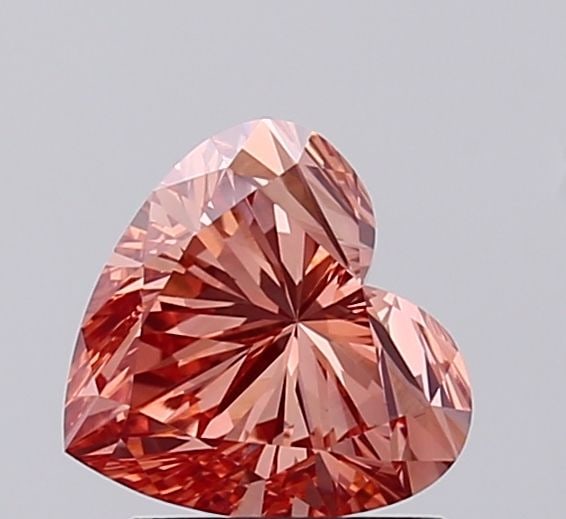 Loose Diamond - HEART 1.25ct Fancy Vivid Pinkish Orange VS1: Loose Diamond - HEART 1.25ct Fancy Vivid Pinkish Orange VS1 Source: This is a real non-mined Diamond that has been grown in a lab Shape: HEART Carats: 1.25 Color: Fancy Vivid Pinkish Orange Certificat