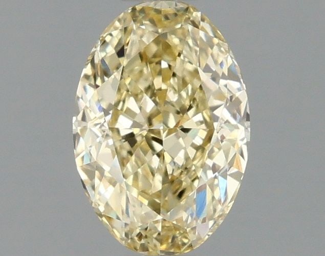 Loose Diamond - OVAL 1.05ct Fancy Yellow VVS2: Loose Diamond - OVAL 1.05ct Fancy Yellow VVS2 Source: This is a real non-mined Diamond that has been grown in a lab Shape: OVAL Carats: 1.05 Color: Fancy Yellow Certification: IGI Video: