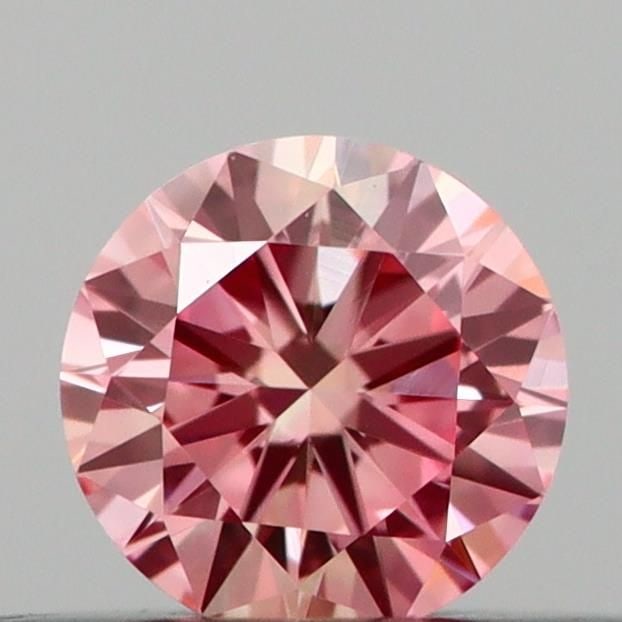 Loose Diamond - ROUND 0.21ct Fancy Vivid Pink VVS2: Loose Diamond - ROUND 0.21ct Fancy Vivid Pink VVS2 Source: This is a real non-mined Diamond that has been grown in a lab Shape: ROUND Carats: 0.21 Color: Fancy Vivid Pink Certification: IGI Video: